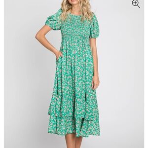 Green floral smocked layer midi dress. Puff sleeves.